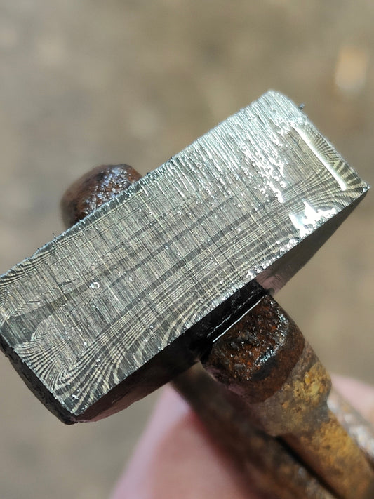 Go mai 02/75ni8 cored with Ni foil and wrought iron cladding